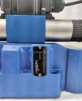 4WRTE16V200L-4X/6EG24K31/A1M - Пропорциональный быстродействующий распределитель с обратной связью по положению золотника и со встроенным усилителем (OBE), Ду16, A1 = ±10 В, номинальный расход 200 л/мин, схема V, каналы управления X и Y = внешние