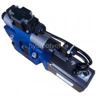 4WRTE10W6-50L-4X/6EG24K31/A1M - Пропорциональный быстродействующий распределитель с обратной связью по положению золотника и со встроенным усилителем (OBE), Ду10, A1 = ±10 В, номинальный расход 50 л/мин, схема W6-, каналы управления X и Y = внешние